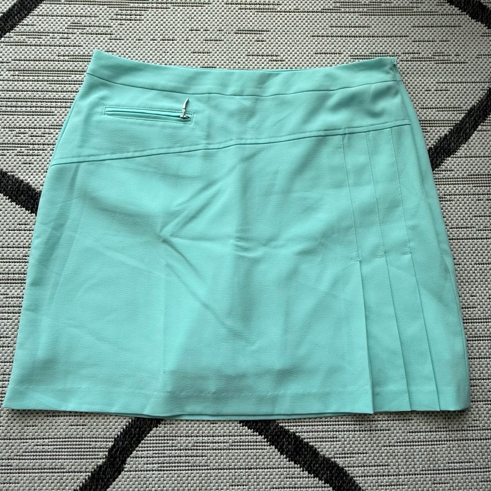 Izod XFG Golf Skort/Skirt Size 4 Aqua Pleat Side Zip Stretch Pockets Pickleball
